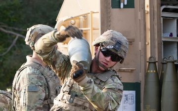 U.S. Soldiers execute Paladin Table VI gunnery in Poland