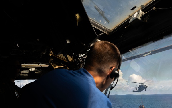 USS Iwo Jima (LHD 7) Conducts A Vertical Replishment-At-Sea with USNS Joshua Humphreys (T-AO-188)