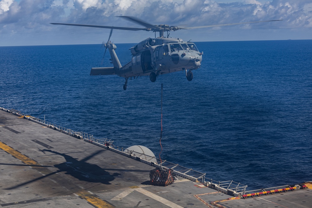 USS Iwo Jima (LHD 7) Conducts A Vertical Replishment-At-Sea with USNS Joshua Humphreys (T-AO-188)