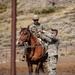 Services members put boots to stirrups during Horsemanship and Animal Packers Course 2-25 