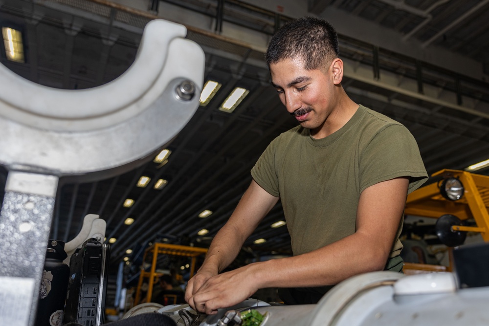 Marines On Board USS Iwo Jima (LHD 7) Reconfigure Signal Detecting Equipment