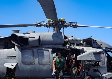 Sailors And U.S. Marines on the Flight Deck of USS Iwo Jima