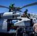 USS Iwo Jima Sailors Conduct Maintenance on a MH-60S