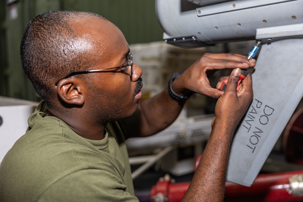 Marines On Board USS Iwo Jima (LHD 7) Reconfigure Signal Detecting Equipment