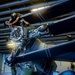 U.S. Marines Work in the Hangar Bay of USS Iwo Jima (LHD 7)