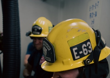 USS Ronald Reagan Calls a Drill for Emergency Rescue, Naval Firefighters Respond