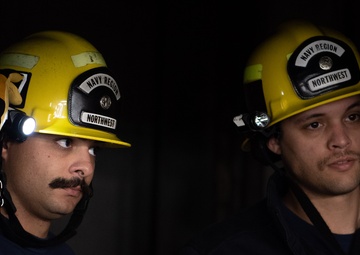 USS Ronald Reagan Calls a Drill for Emergency Rescue, Naval Firefighters Respond