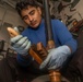 USS Iwo Jima (LHD 7) Sailor Maintains Ship Equipment