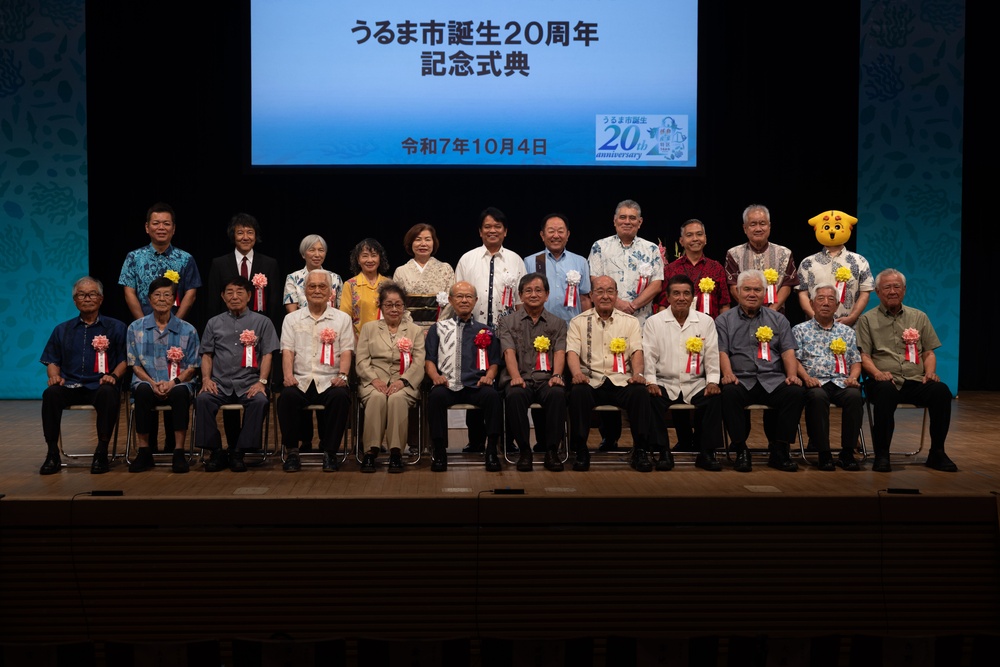 Ichiro Umehara accepts city-level award on behalf of Camp Courtney from Uruma City