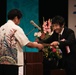 Ichiro Umehara accepts city-level award on behalf of Camp Courtney from Uruma City