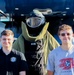 A Navy Recruiter and A Member Of The Delayed Entry Program Pose For A Photo