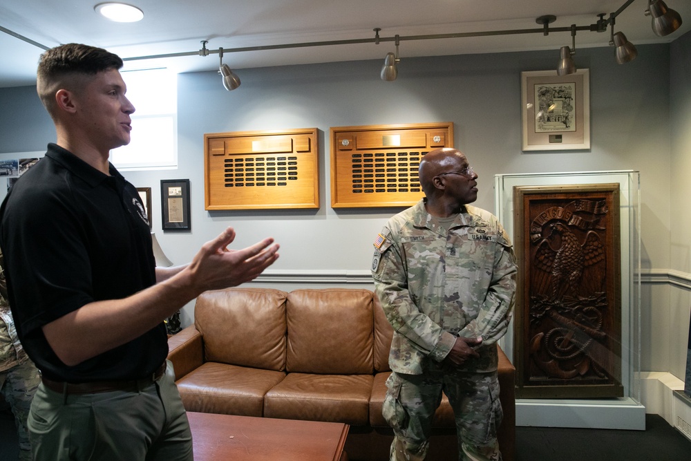 Guards at Arlington National Cemetery are presented with coins by Command Sergeant Major of the DC National Guard