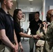 Guards at Arlington National Cemetery are presented with coins by Command Sergeant Major of the DC National Guard