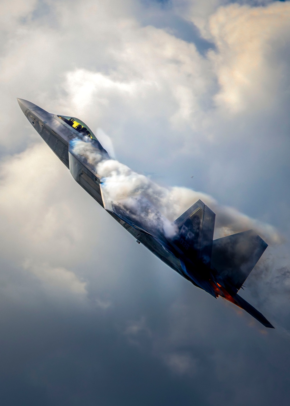 F-22 Raptor Soars Through Clouds at NAS Oceana