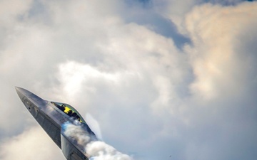 F-22 Raptor Soars Through Clouds at NAS Oceana