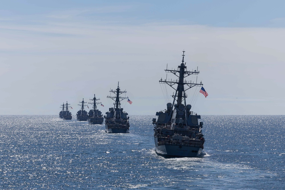 USS Cole participates in the Titans of the Sea Presidential Review celebrating the Navy’s 250th birthday.