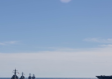 USS Cole participates in the Titans of the Sea Presidential Review celebrating the Navy’s 250th birthday.