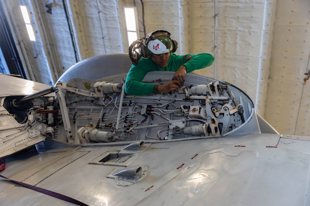 VAQ-124 Sailor Performs Routine Maintenance VAQ-124 Sailor Performs Routine Maintenance