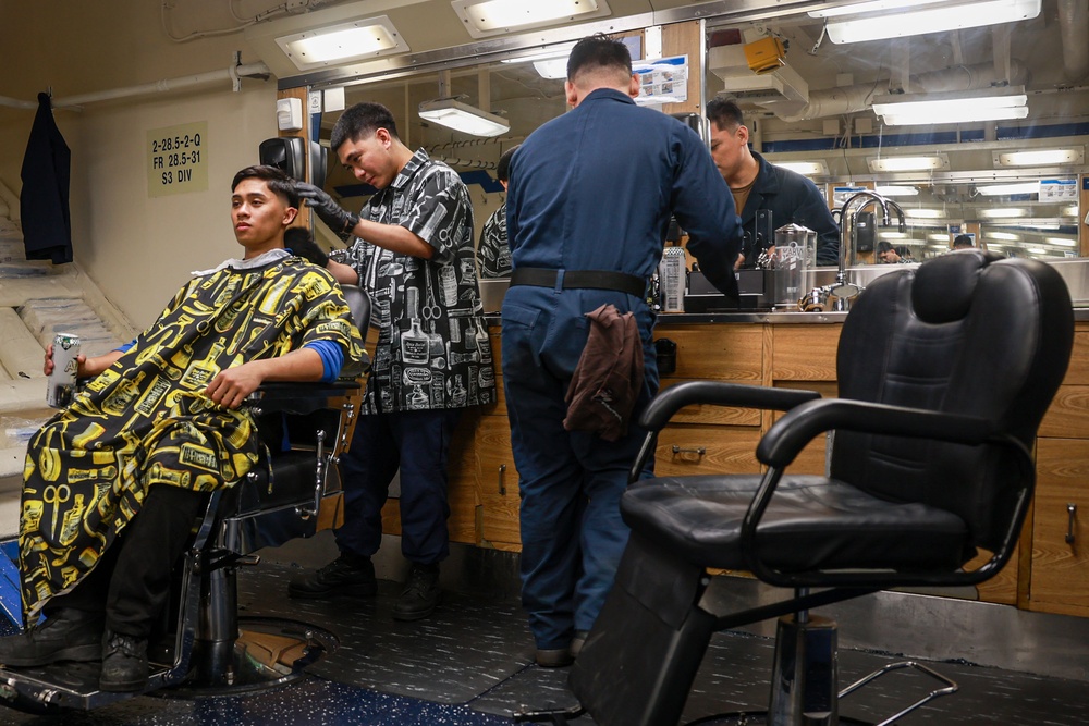 USS Iwo Jima Sailors Cut Hair in the Barber Shop