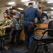 USS Iwo Jima Sailors Cut Hair in the Barber Shop