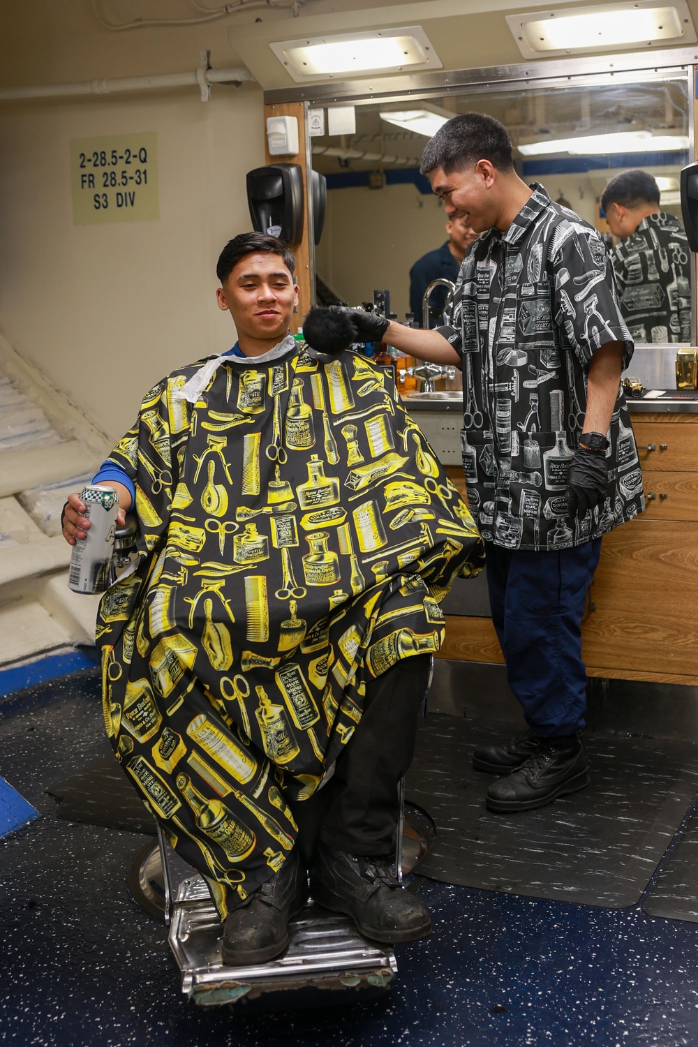 Iwo Jima Sailors Cut Hair in the Barber Shop