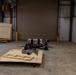 ABE 101 hovering over plywood at manufacturing warehouse