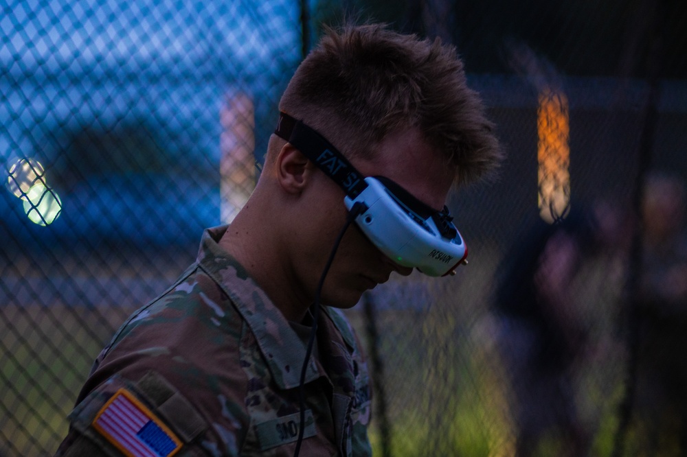 PFC Sund wears FPV goggles while flying ABE 1.01