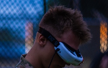 PFC Sund wears FPV goggles while flying ABE 1.01