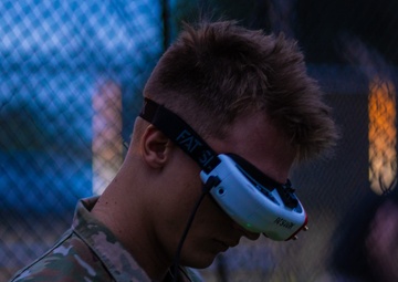 PFC Sund wears FPV goggles while flying ABE 1.01
