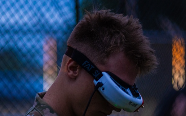 PFC Sund wears FPV goggles while flying ABE 1.01
