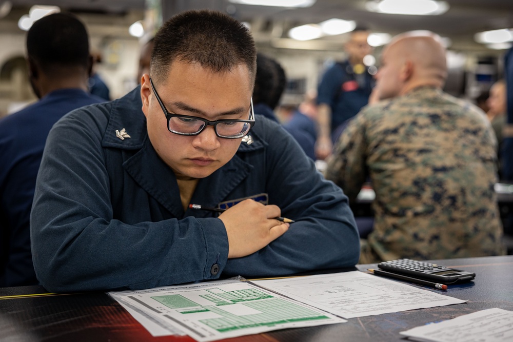 USS Iwo Jima Sailors Take The E-6 Exam