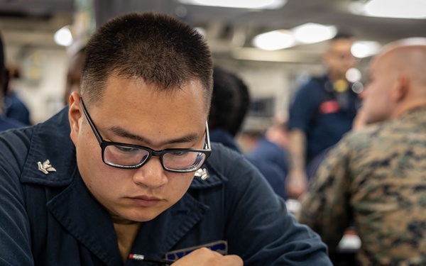USS Iwo Jima Sailors Take The E-6 Exam