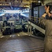 U.S. Marine Moves Vehicles aboard USS Iwo Jima