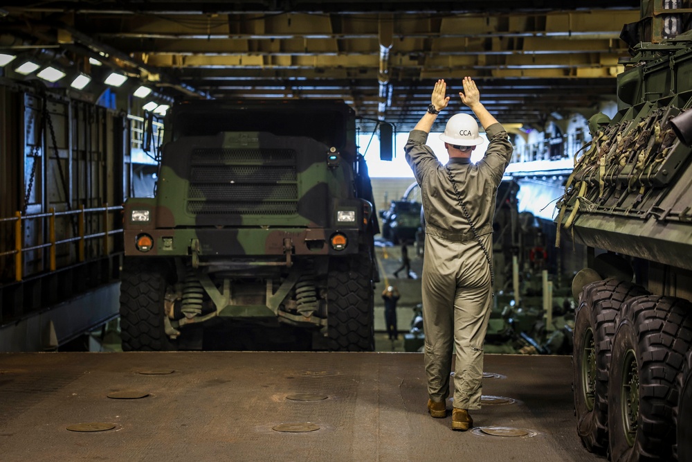 U.S. Marines Move Vehicles abaord USS Iwo JIma