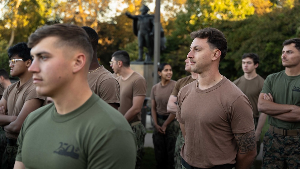 Sailors and Marines run the Rocky Steps during Navy and Marine Corps 250