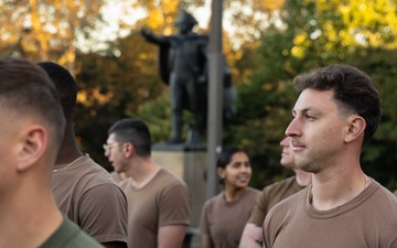 Sailors and Marines run the Rocky Steps during Navy and Marine Corps 250