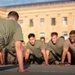 Sailors and Marines run the Rocky Steps during Navy and Marine Corps 250
