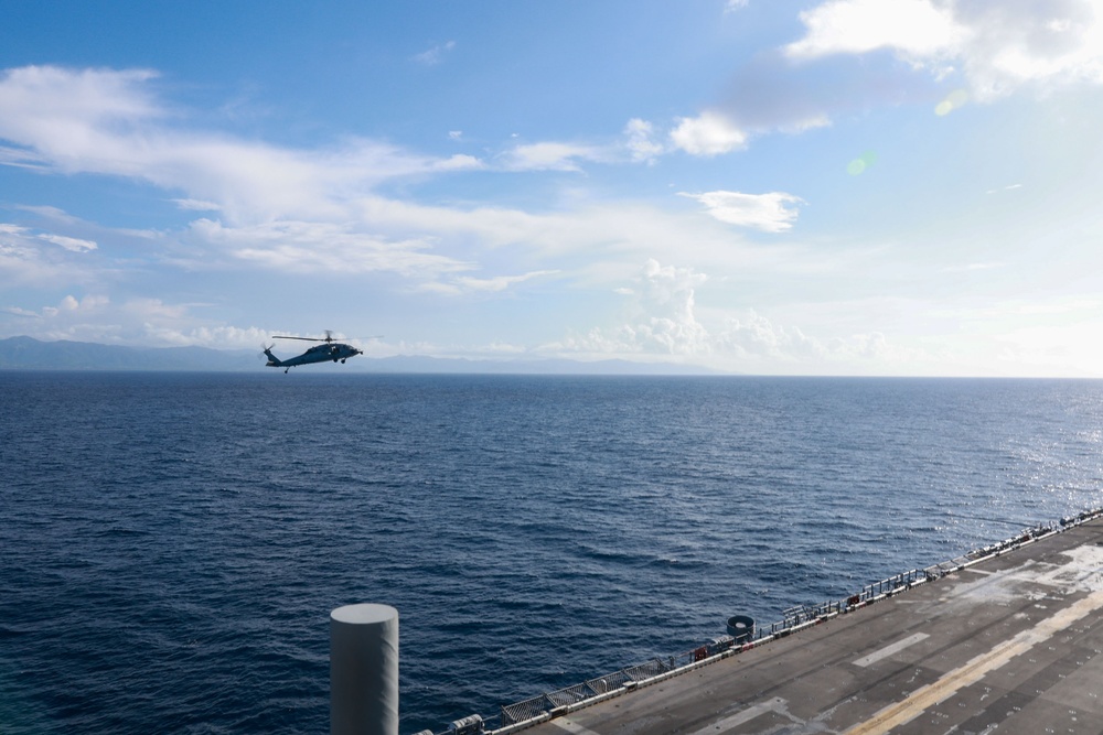 Iwo Jima Sailors and US Marines Conduct Flight  and Boat Operations