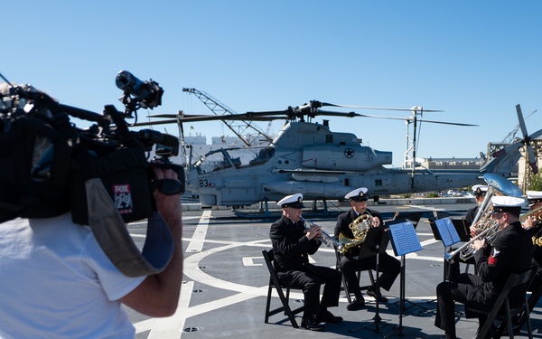 U.S. Navy Band performs for media touring USS Arlington