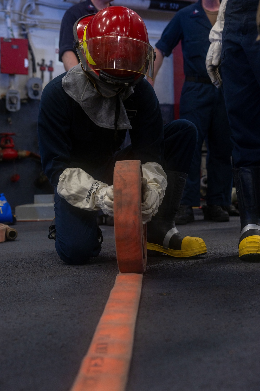USS Iwo Jima Sailors Conduct a Damage Control Training Evolution USS Iwo Jima Sailors Conduct a Damage Control Training Evolution