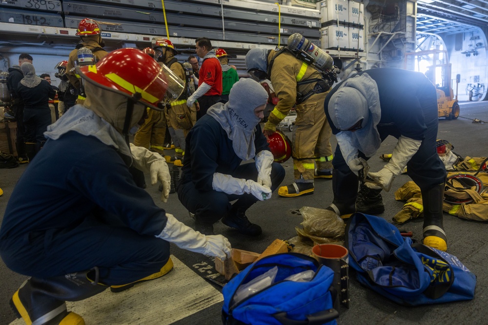 USS Iwo Jima Sailors Conduct a Damage Control Training Evolution USS Iwo Jima Sailors Conduct a Damage Control Training Evolution