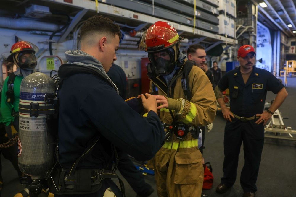 USS Iwo Jima Sailors Conduct a Damage Control Training Evolution USS Iwo Jima Sailors Conduct a Damage Control Training Evolution