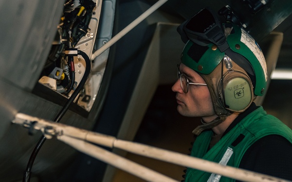VAQ-142 Sailor Conducts Maintenance