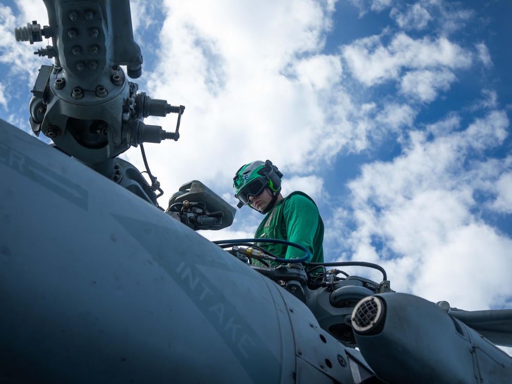 HSM-70 Sailor Conducts Maintenance
