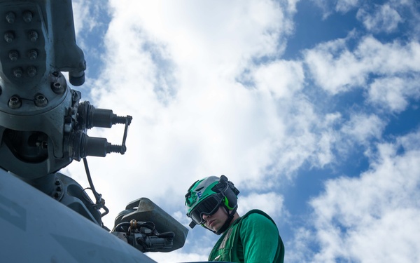 HSM-70 Sailor Conducts Maintenance
