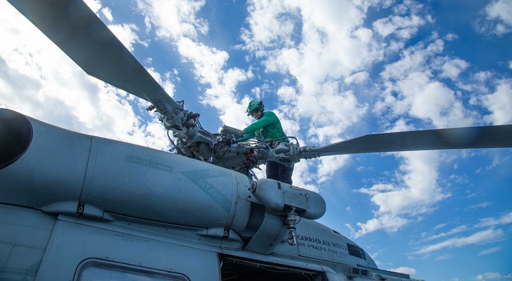HSM-70 Sailor Conducts Maintenance