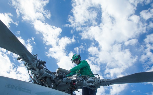HSM-70 Sailor Conducts Maintenance