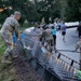 Federal Workers and National Guardsmen Work Together