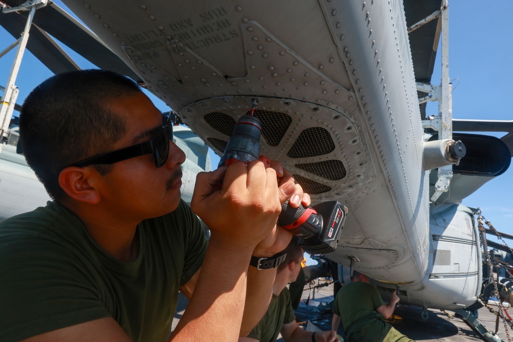 U.S. Marines Conduct Aircraft Maintenance Aboard USS Iwo Jima