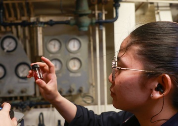 Iwo Jima Sailors Conduct Maintenance